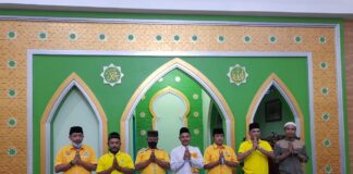 Partai Golkar Sei Beduk Bagikan Ribuan Paket Sarung dan Sajadah