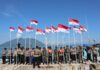 Polres Natuna Kibarkan Bendera Merah Putih di Pulau Terluar Perbatasan Malaysia bendera di pulau terluar