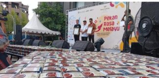 Pecahkan Rekor Muri, Santika Batam Masak 1.118 Porsi Ikan Asam Pedas Dengan Cabai Kering